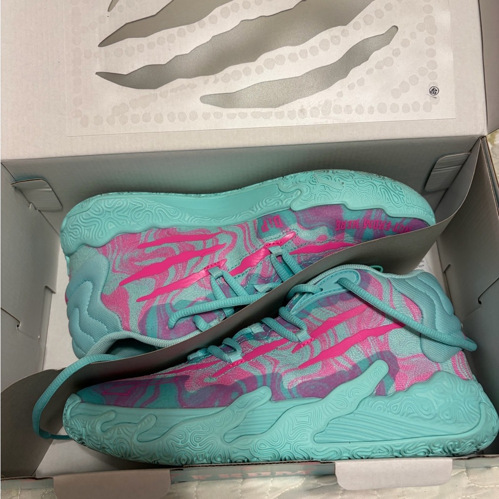 Vibrant Teal and Pink basketball sneakers